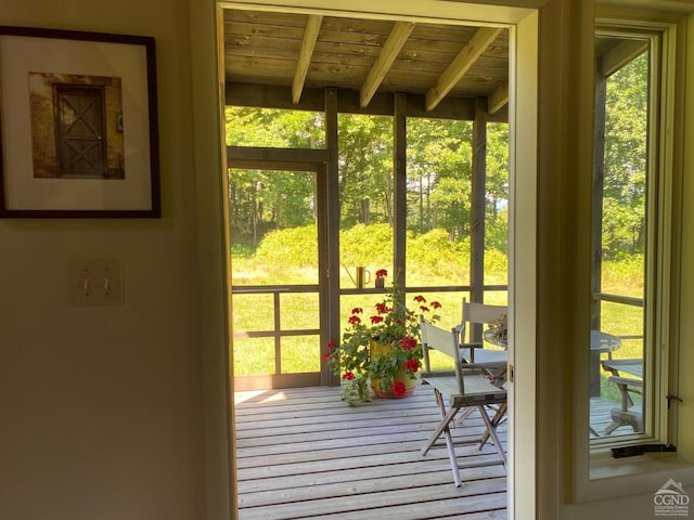 doorway to outside featuring wooden ceiling