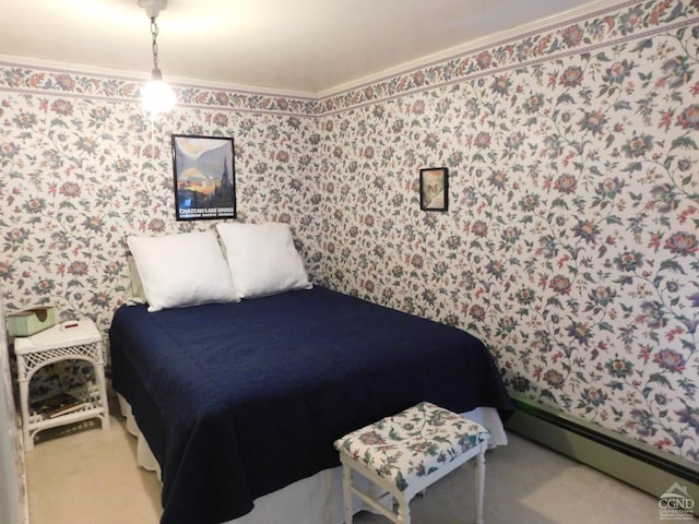 carpeted bedroom featuring baseboard heating and ornamental molding