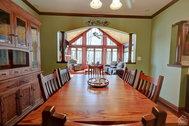 dining room featuring ceiling fan, crown molding, and decorative columns