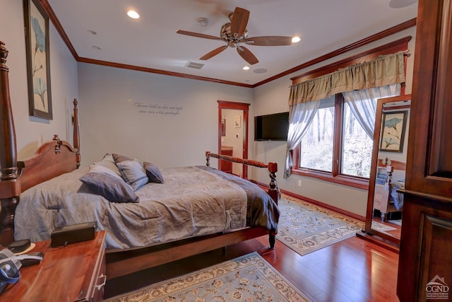 bedroom with wood-type flooring, ceiling fan, and ornamental molding