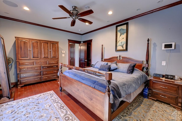 tiled bedroom featuring ceiling fan and crown molding