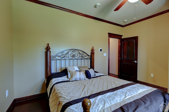 bedroom featuring ceiling fan and crown molding