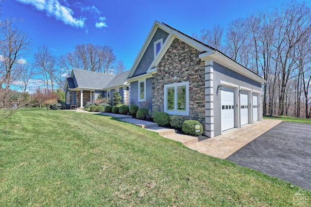 exterior space with a lawn and a garage