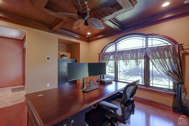 office area featuring coffered ceiling, crown molding, light hardwood / wood-style flooring, ceiling fan, and wood ceiling