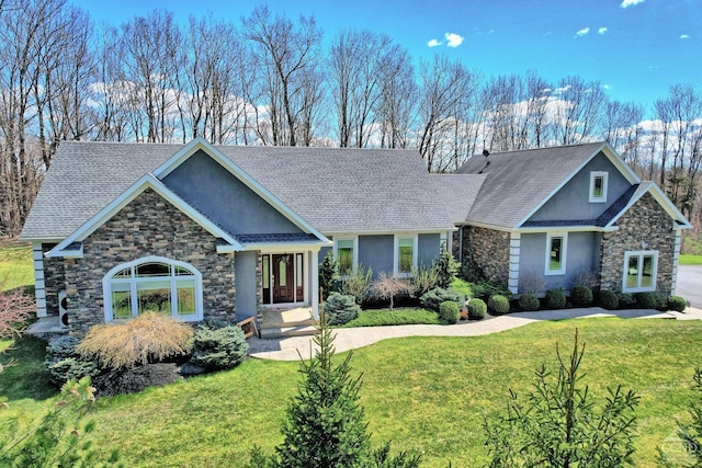 craftsman-style house with a front yard