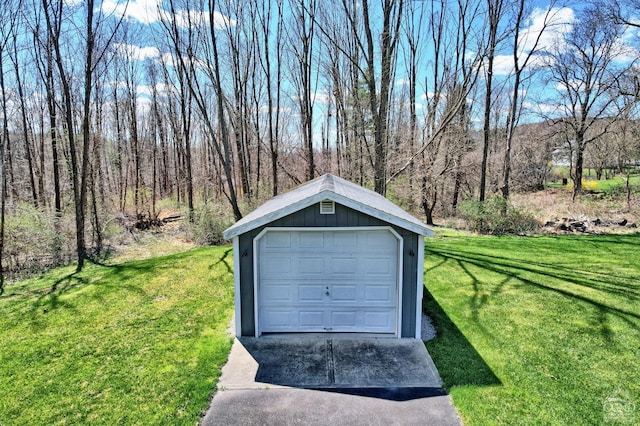 garage featuring a yard