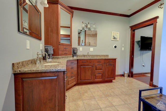 bathroom with vanity and crown molding