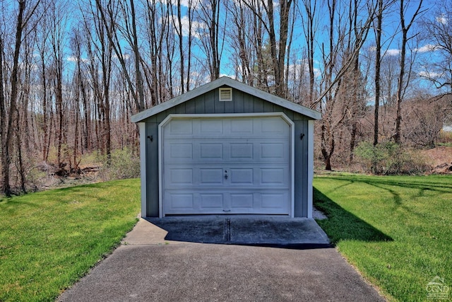 garage with a lawn