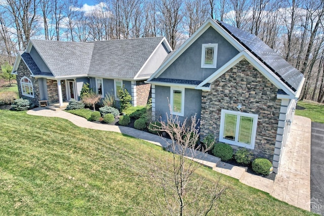 craftsman house with solar panels and a front lawn