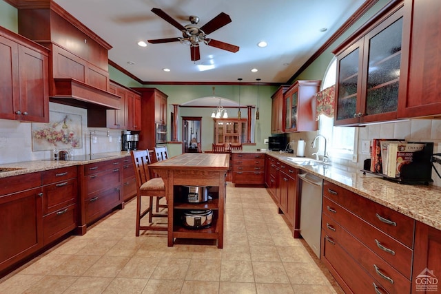 kitchen with tasteful backsplash, stainless steel dishwasher, ceiling fan with notable chandelier, crown molding, and sink