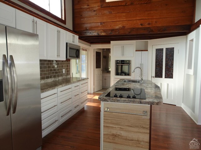 kitchen with white cabinets, dark wood-type flooring, sink, black appliances, and stone counters