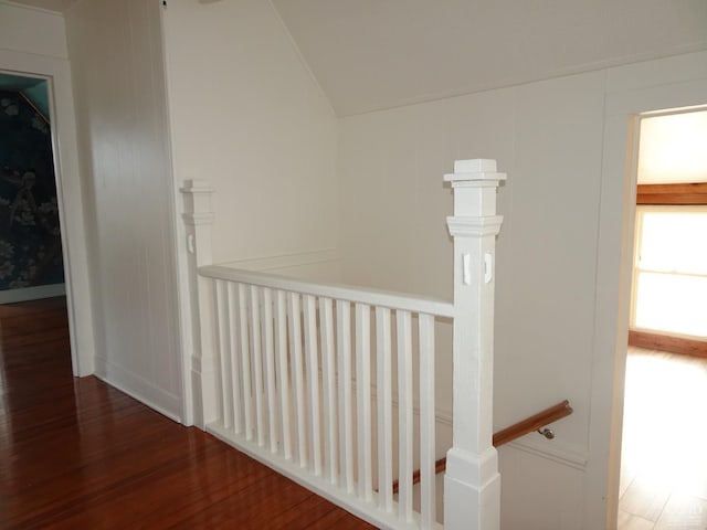 hall with dark hardwood / wood-style floors