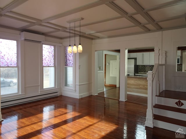 unfurnished dining area featuring a wall mounted AC, wood-type flooring, a baseboard radiator, and plenty of natural light