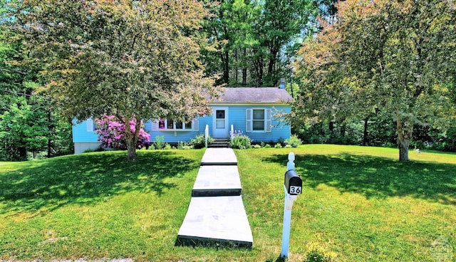 view of front of house with a front lawn