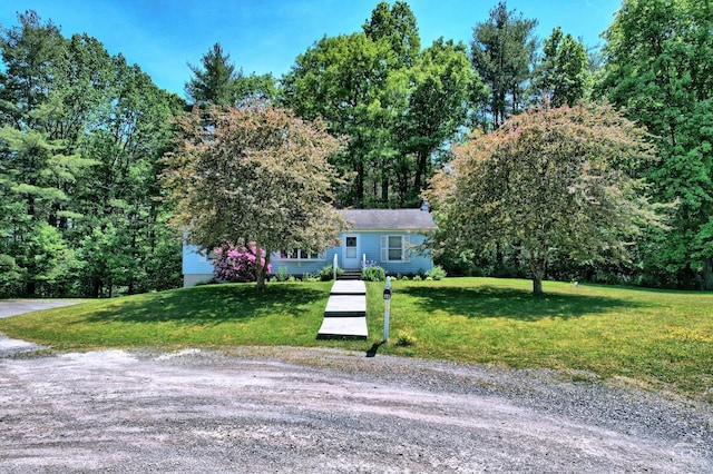 view of front of home with a front lawn