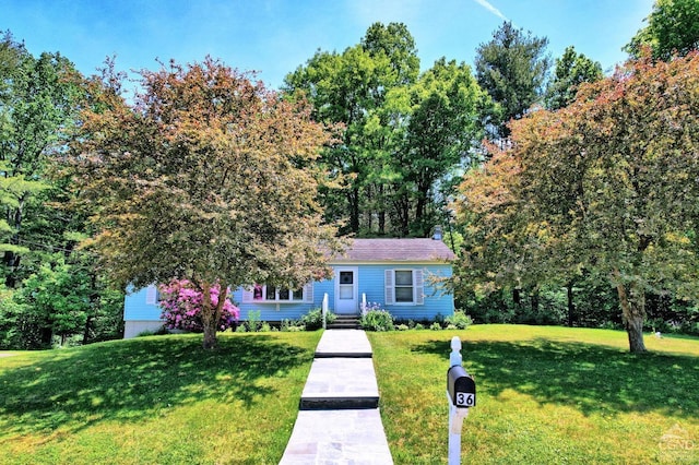 view of front of property with a front lawn