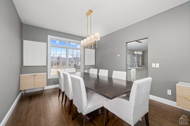 dining space with a notable chandelier, dark wood-style floors, and baseboards