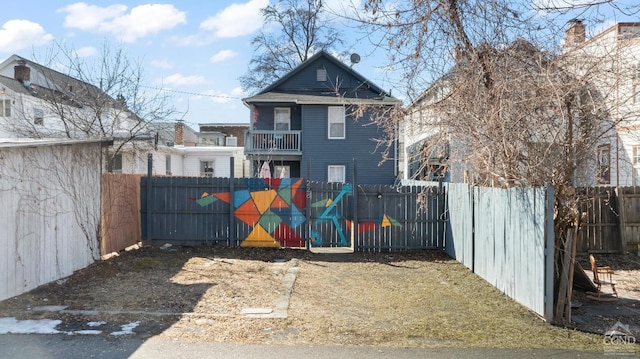 rear view of property with fence private yard