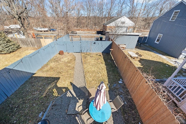 details with a fenced backyard