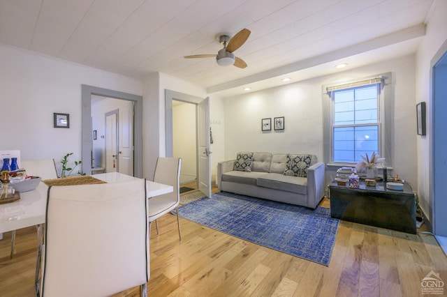 living area featuring recessed lighting, a ceiling fan, and light wood-style floors