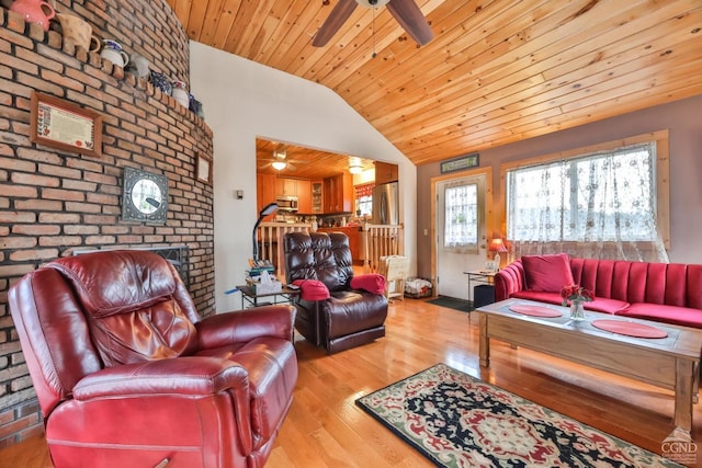 living room with wooden ceiling, lofted ceiling, and light wood-type flooring