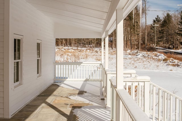 view of snow covered patio