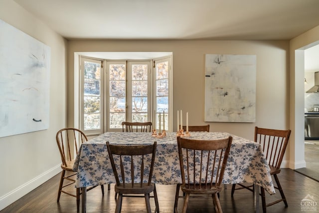 dining area with dark wood-type flooring