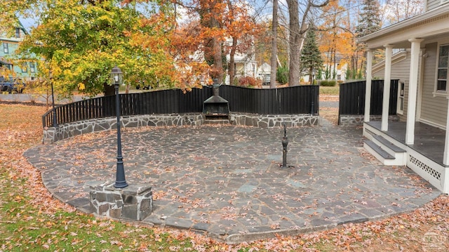 view of patio / terrace with a fireplace