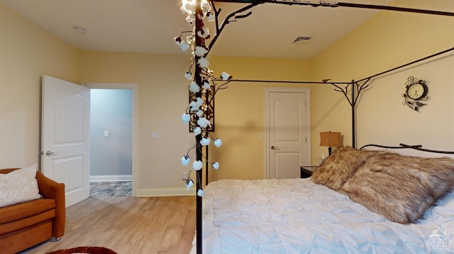 bedroom featuring light wood-type flooring