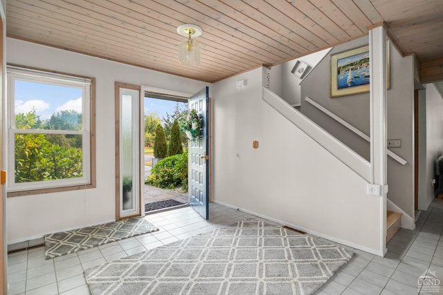 tiled foyer with wooden ceiling