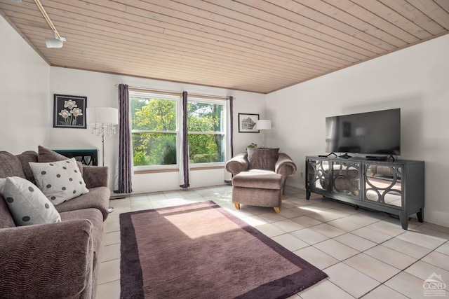 living room featuring light tile patterned floors, track lighting, and wooden ceiling