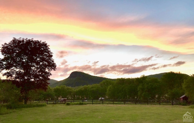 view of mountain feature with a rural view