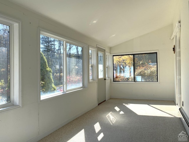 unfurnished sunroom featuring lofted ceiling