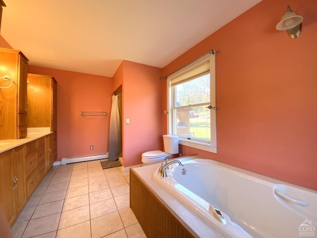 bathroom featuring tile patterned floors, vanity, baseboard heating, toilet, and a tub