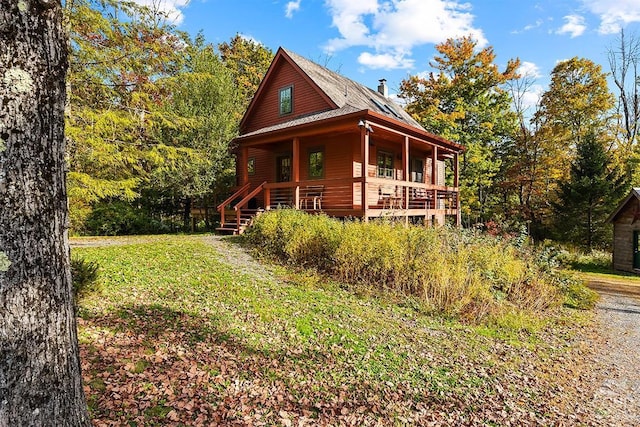 view of home's exterior featuring a porch