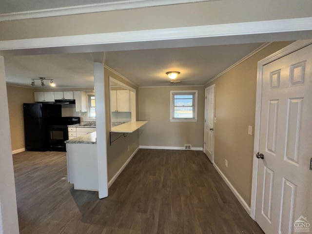 kitchen with white cabinets, dark hardwood / wood-style flooring, crown molding, and black appliances