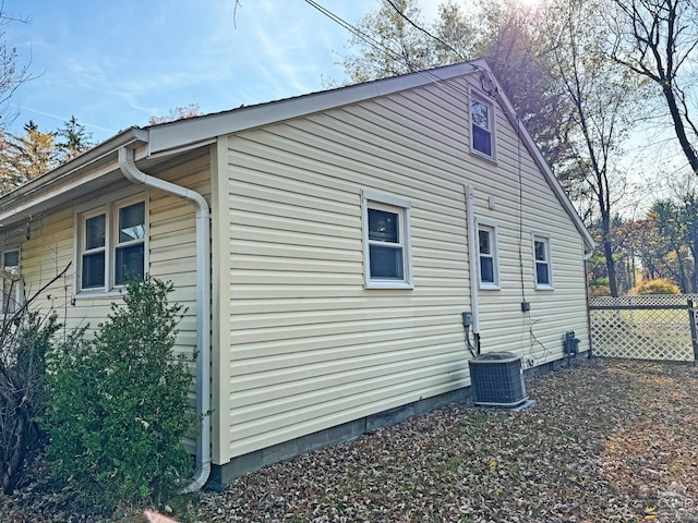 view of home's exterior with central AC unit