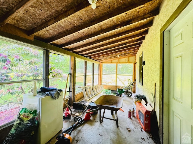 sunroom featuring lofted ceiling