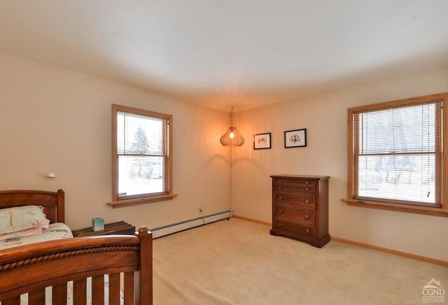 bedroom with light colored carpet, multiple windows, and a baseboard radiator