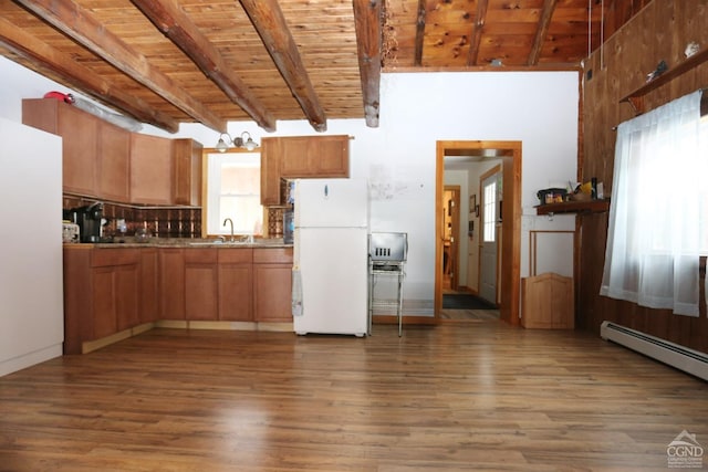 kitchen with dark hardwood / wood-style floors, white fridge, wood ceiling, and beam ceiling