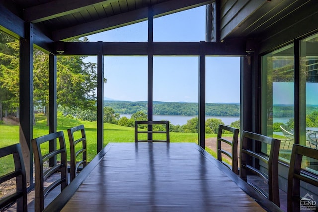 sunroom with a water view