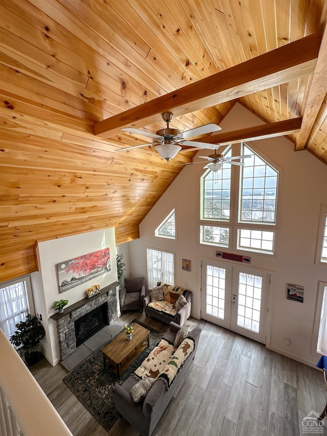 living room with hardwood / wood-style floors, beam ceiling, wood ceiling, and high vaulted ceiling