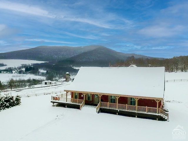 exterior space featuring a mountain view