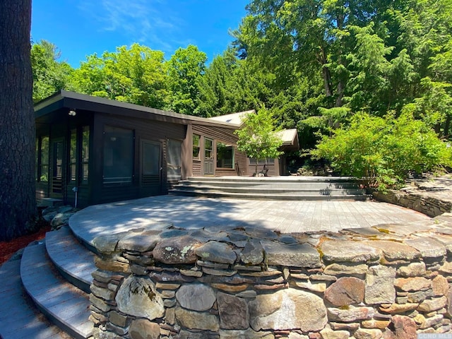 back of property with a patio area