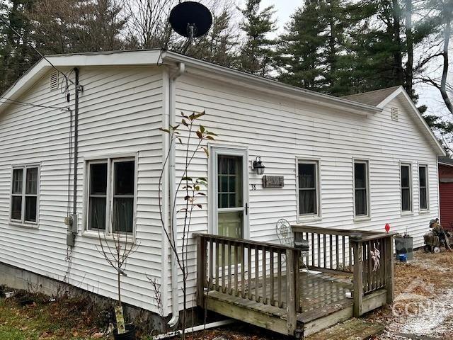 rear view of house with a deck