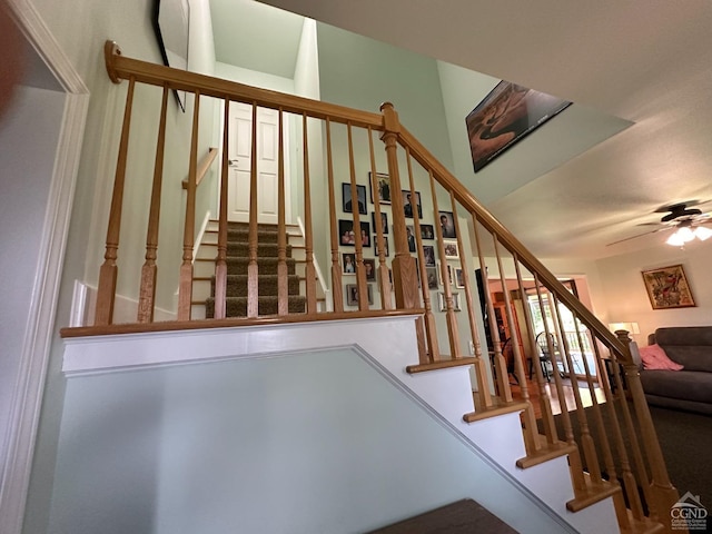 staircase with ceiling fan