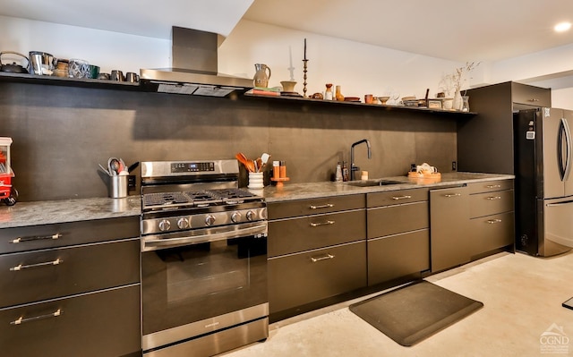 kitchen featuring stainless steel appliances, extractor fan, and sink