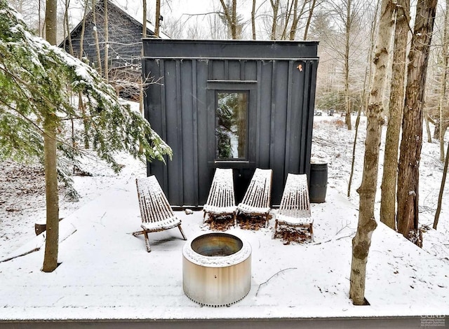 view of snow covered patio