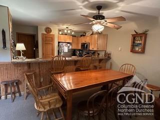 dining room with ceiling fan