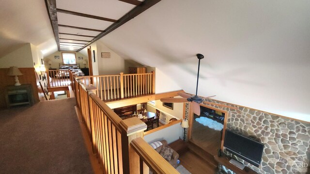 staircase with lofted ceiling with beams and ceiling fan